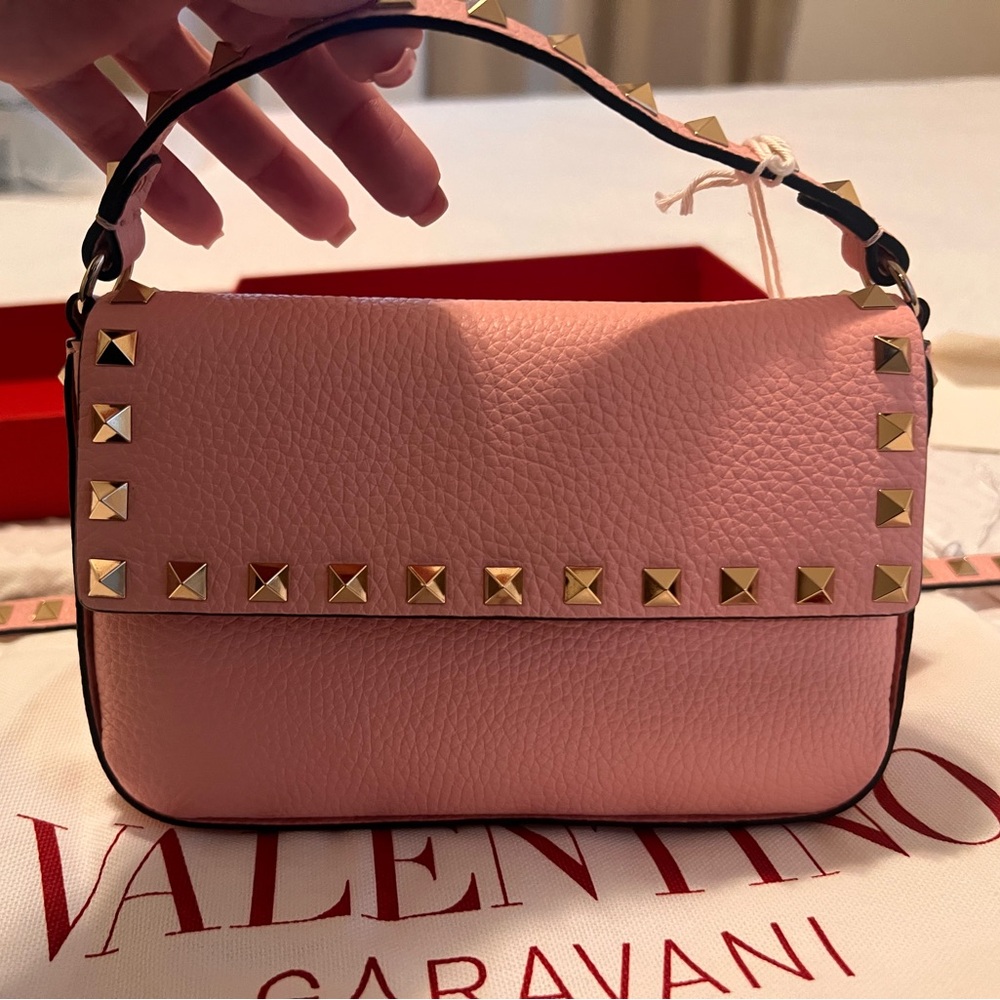 Valentino small bag with top handle and removable long strap. Worn once.